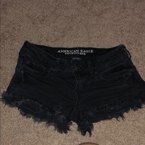 Black ripped shorts